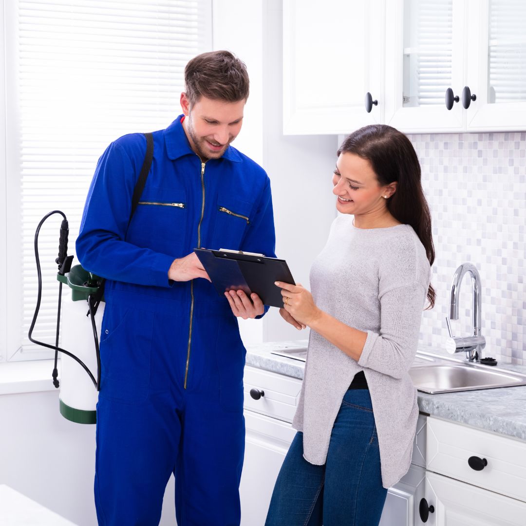 pest control worker and customer