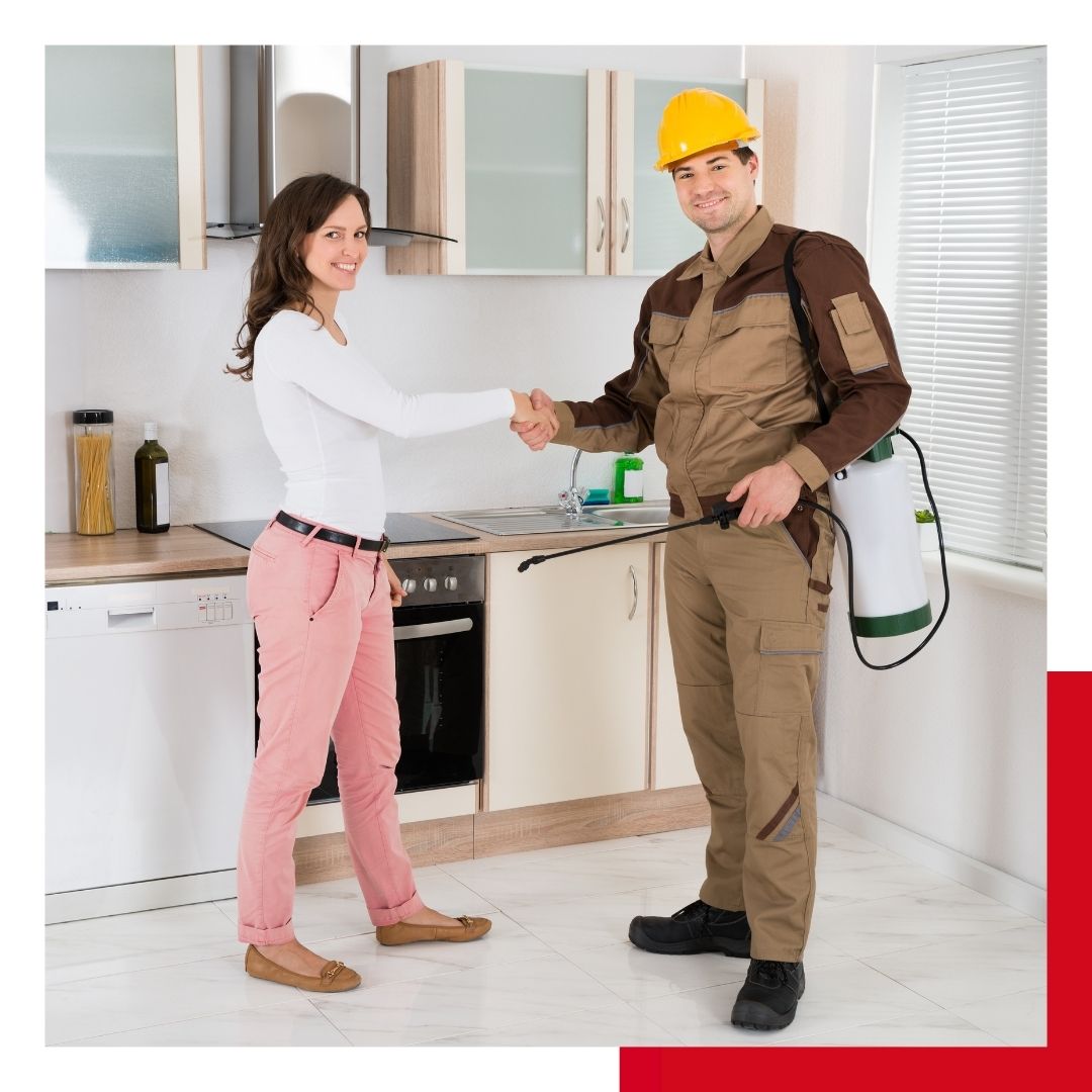 homeowner shaking hands with a pest control technician.